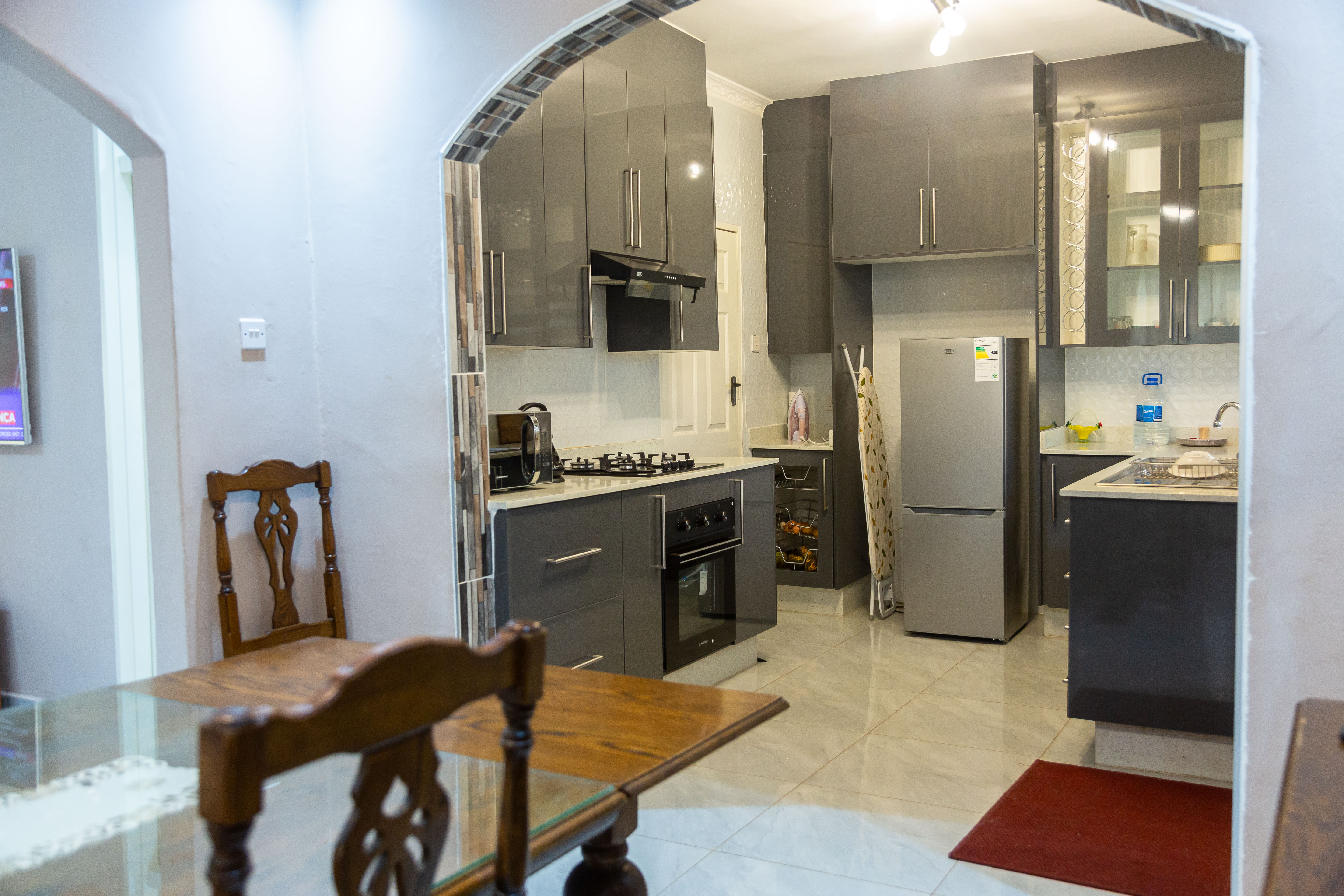 Kitchen viewed from the dining room archway