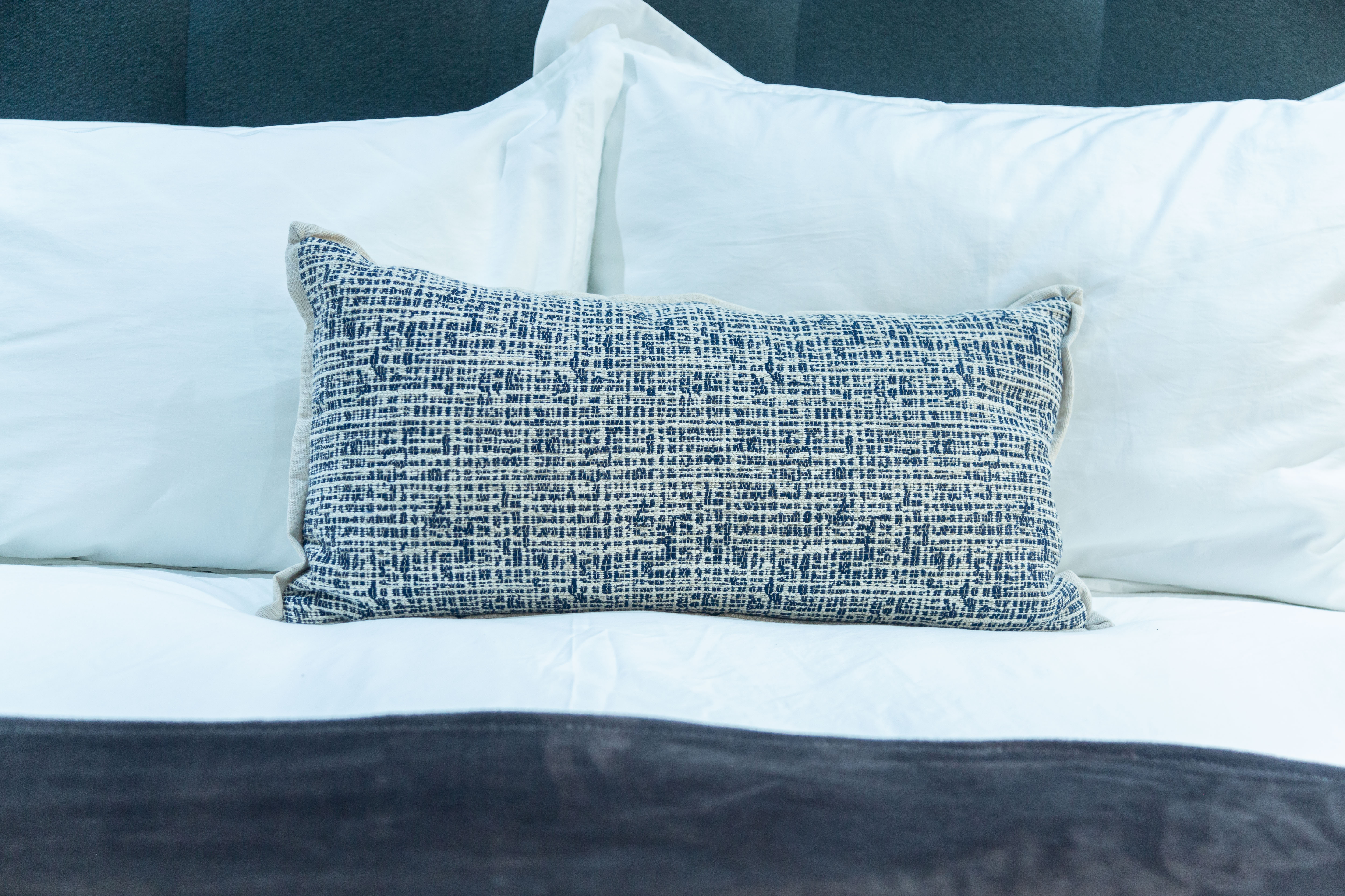 Decorative cushion on the bed