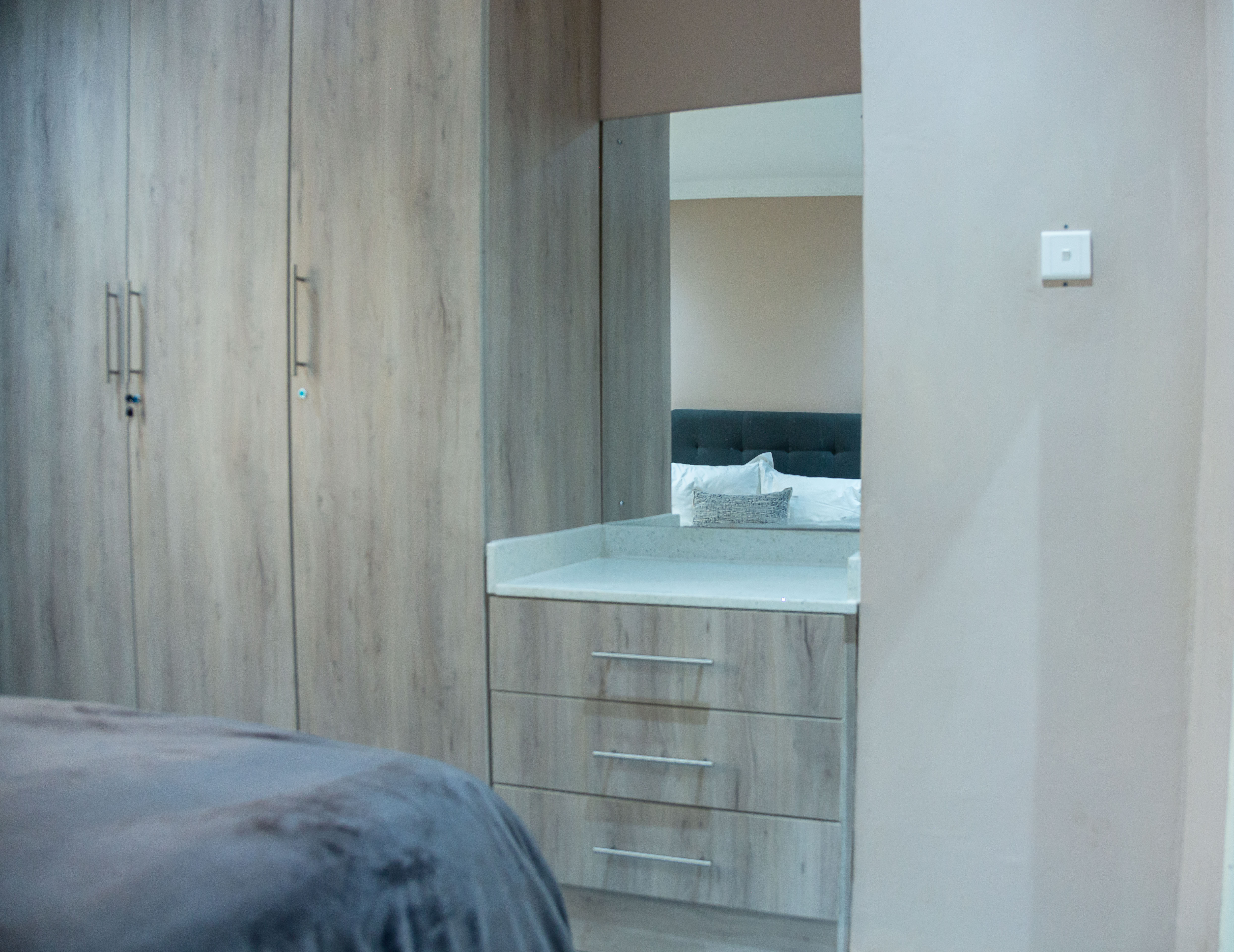 Wardrobe and mirror unit in the bedroom